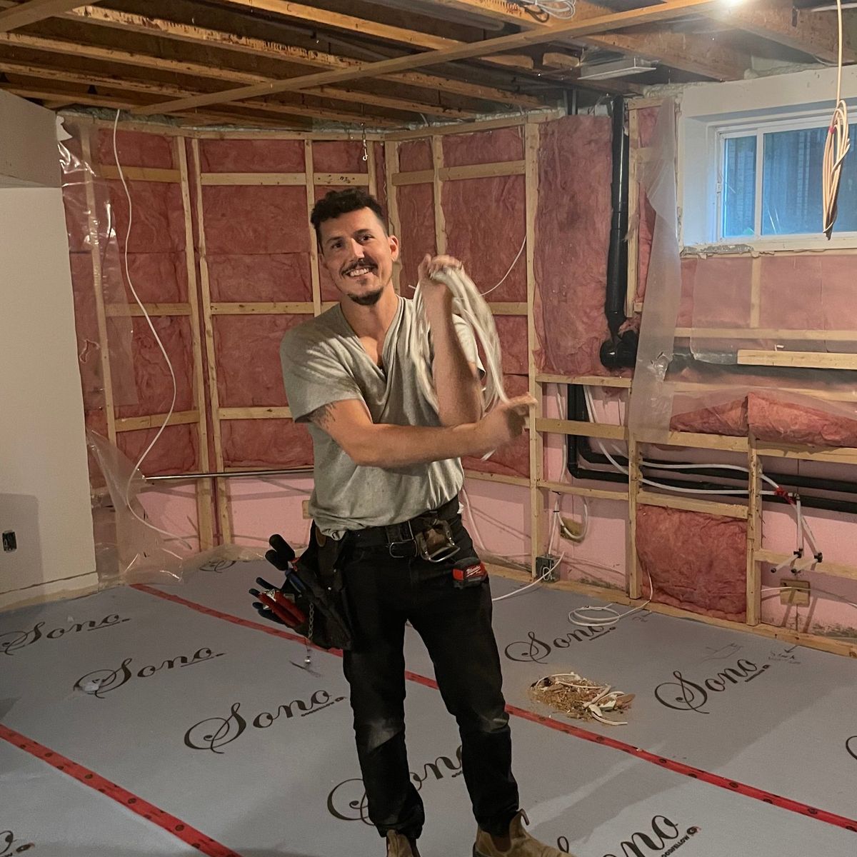Sebastian Adeluca, owner of Adesso Renovations, on a job site